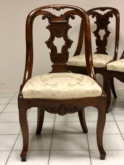 Group of four Charles X gondola chairs. Early 19th century