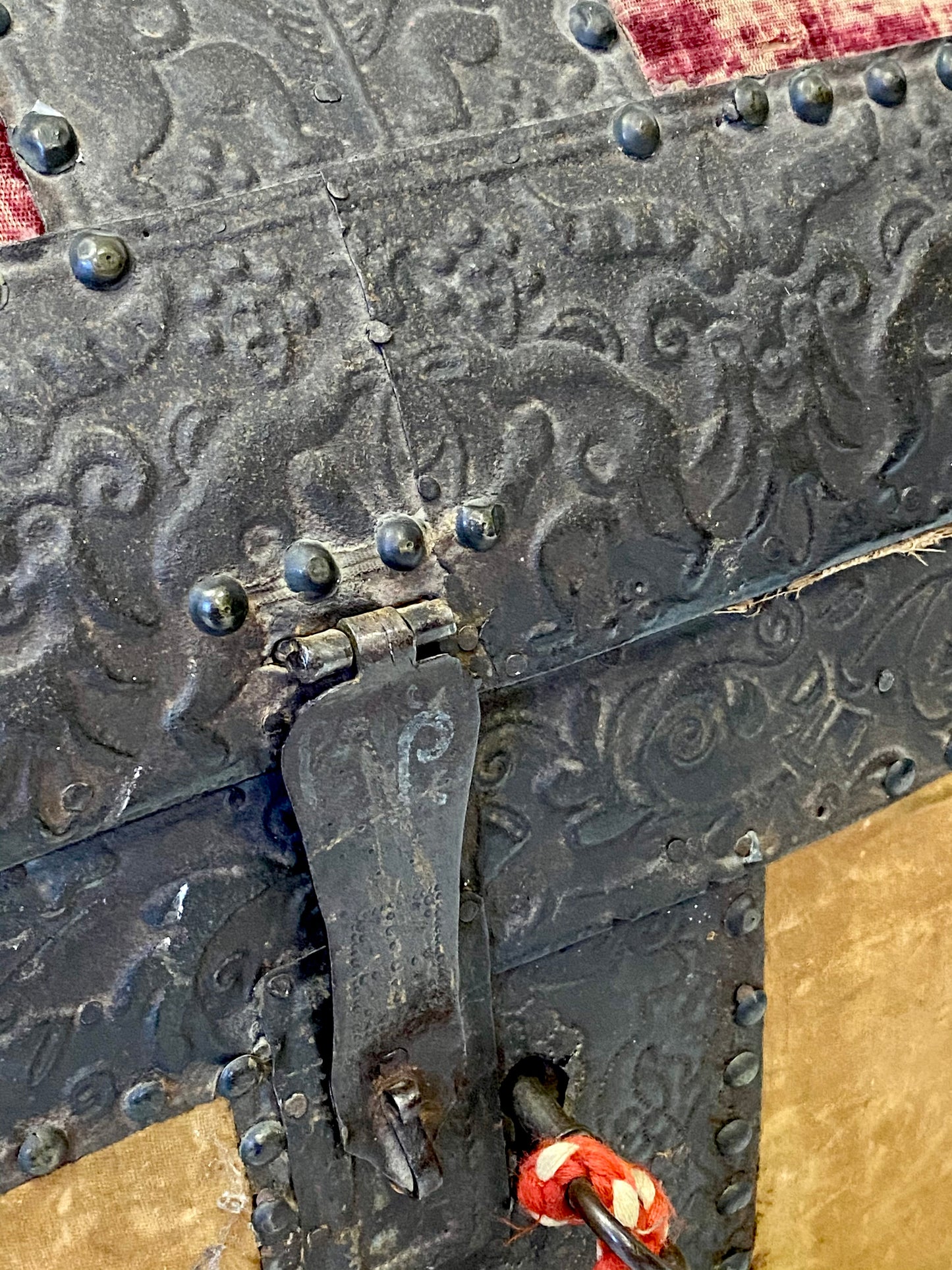 Chest covered in embossed sheet metal and velvet panels. Venice 16th century