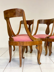 Gruppo di quattro sedie in piuma di noce impero a pozzetto . XIX secolo