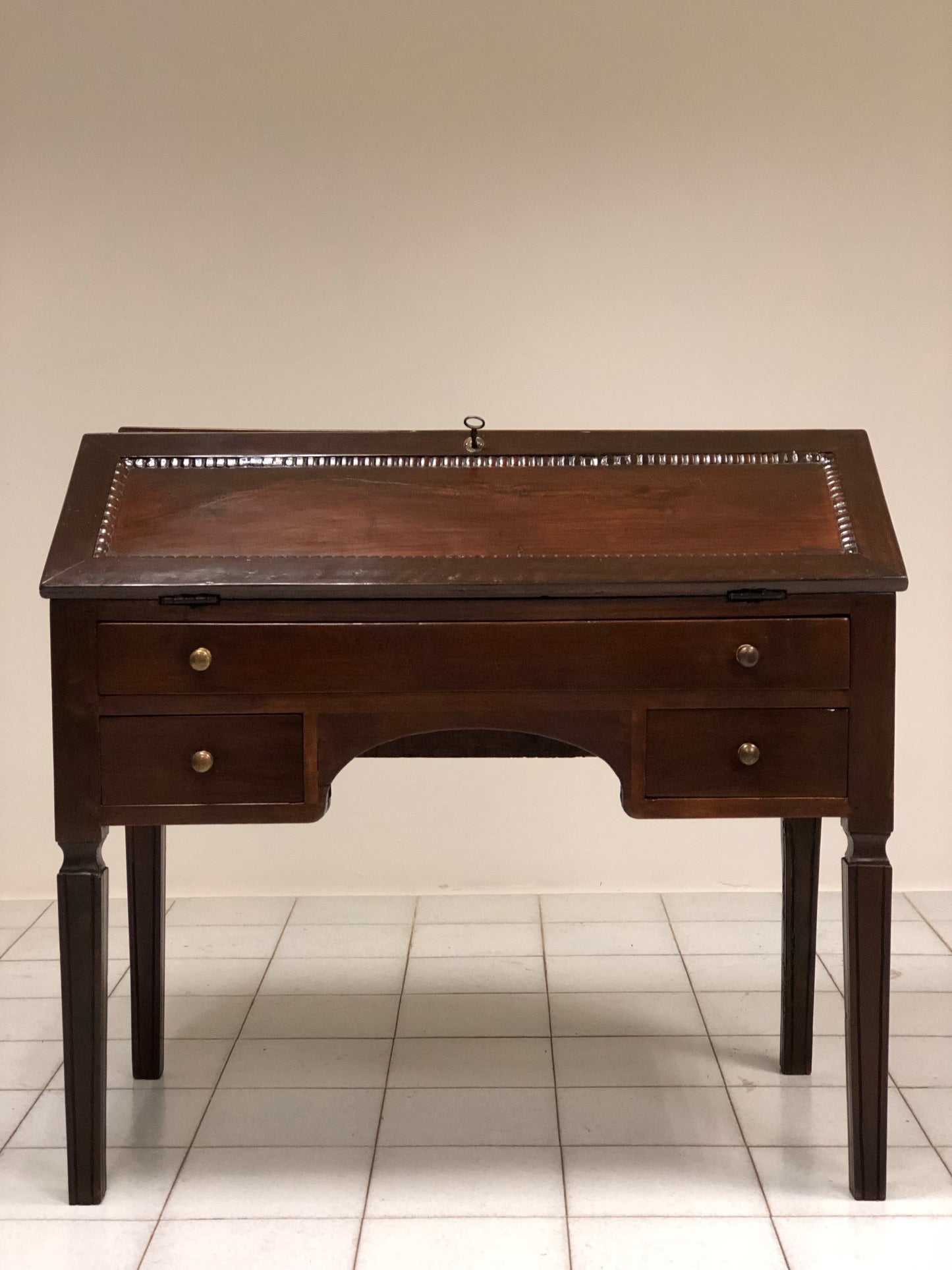 Louis XVI walnut drop-leaf desk.