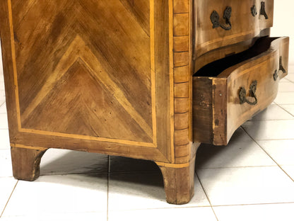 Louis XV chest of drawers with curved front