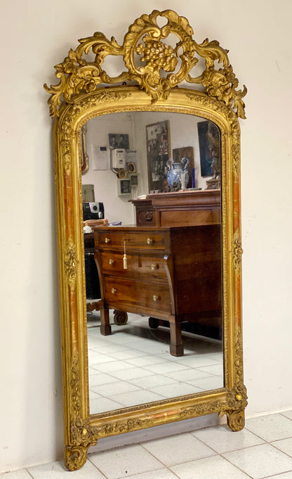 Charles X mirror, gilded carved wood, 19th century.