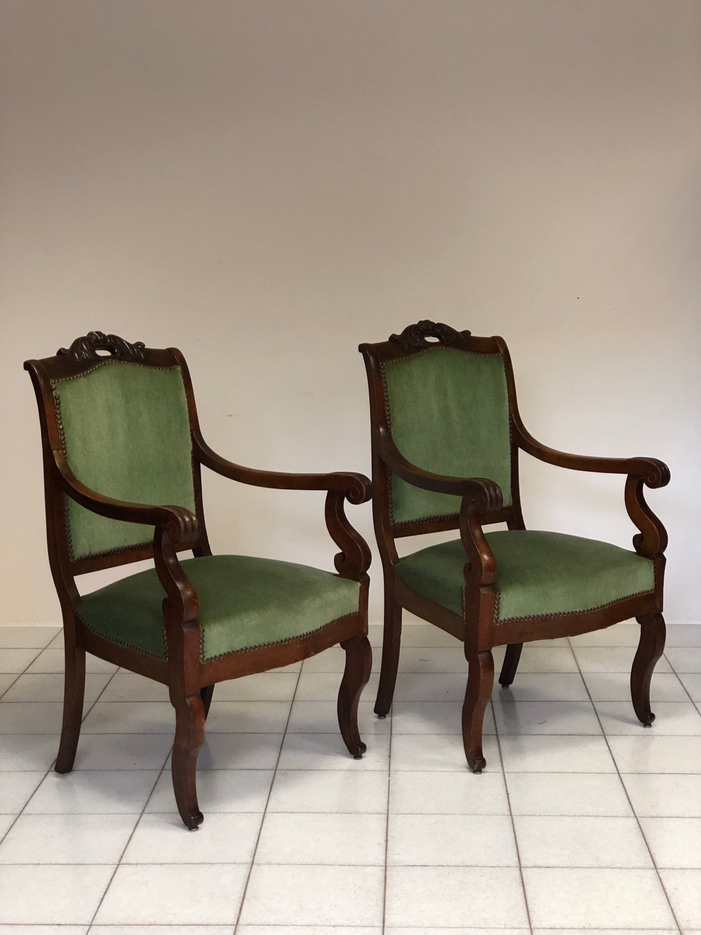 Pair of Lombard Empire Walnut Armchairs. Early 19th Century