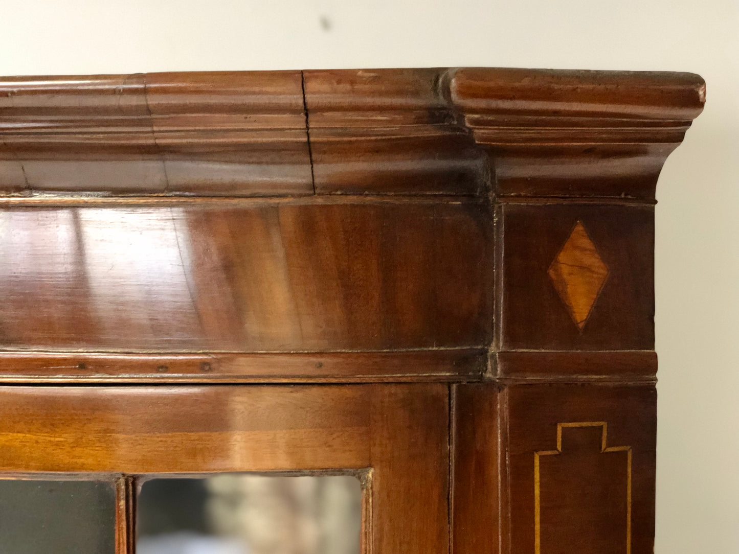 Inlaid curved corner cabinet, mid 19th century