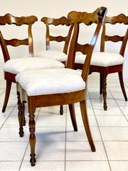 Gruppo di quattro sedie intarsiate Carlo X . Inizio XIX secolo
