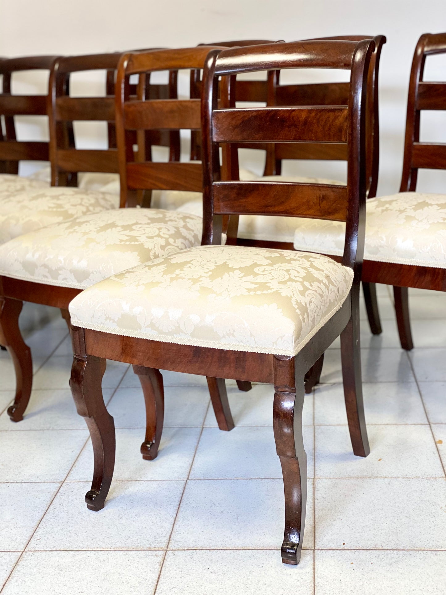 Group of ten Charles X walnut chairs, first half of the 19th century