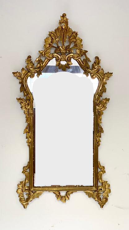 Specchiera in legno intagliato e dorato