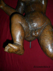 Putto in legno di noce del Cinquecento